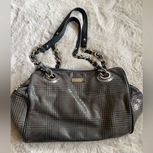 Kate Spade.  Womens handbag.  Leather.  Grey.  3 interior pockets.